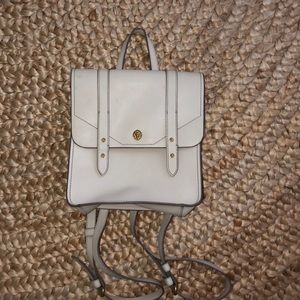 A light tan Anne Klein backpack